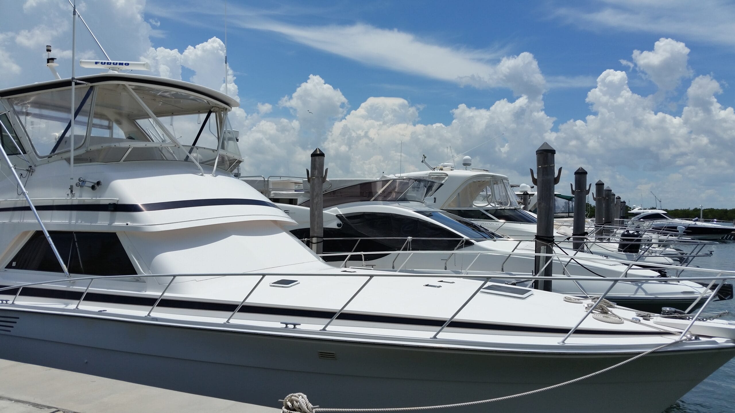 Private yachts in Miami with visible canvas work