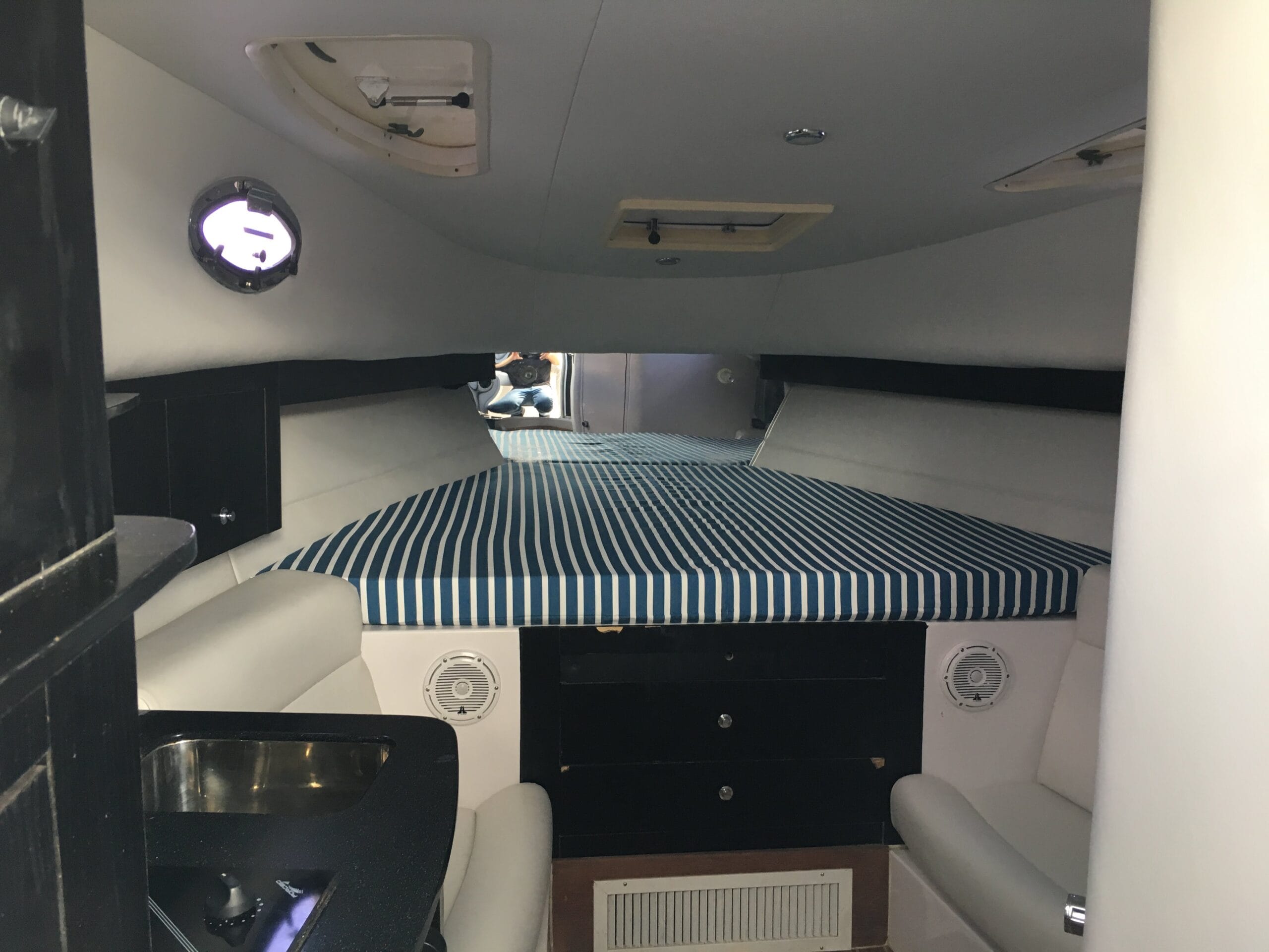 boat interior upholstery white cabin  with sunbrella cushions
