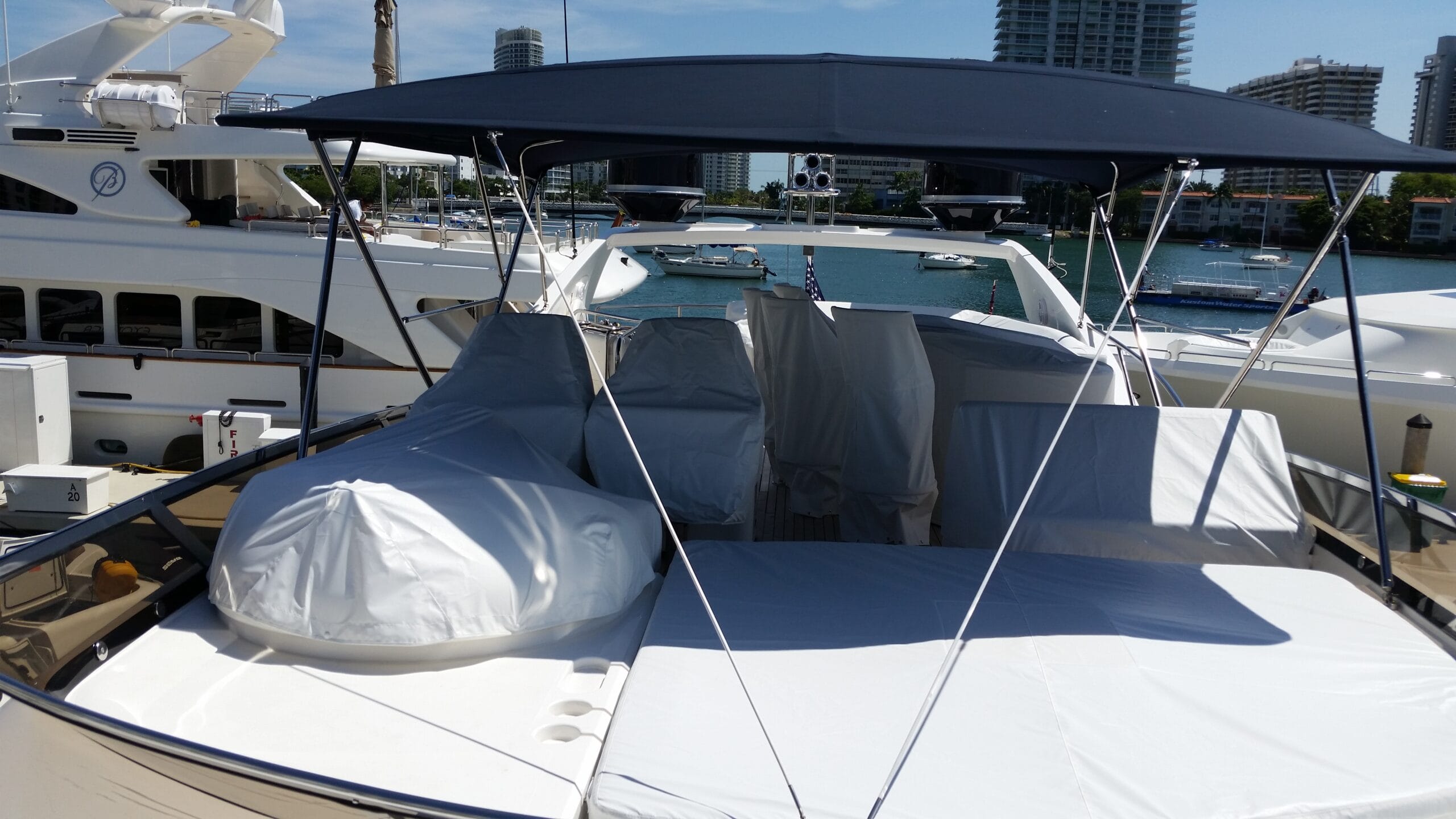 White individual covers yacht seating and tender boat 