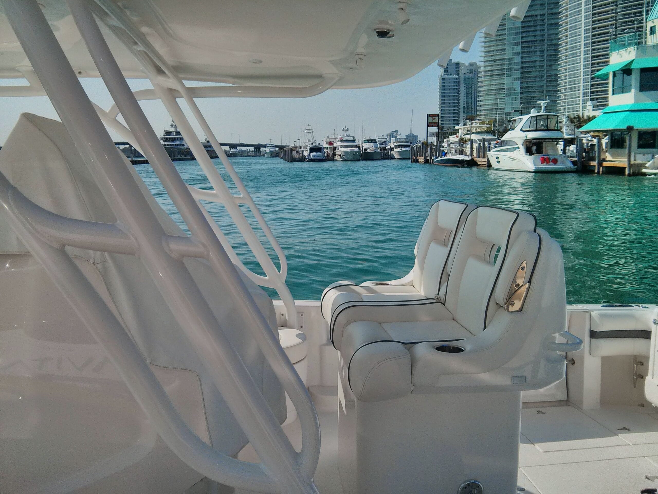 Intrepid boat in Miami with visible helm seat white upholstery work