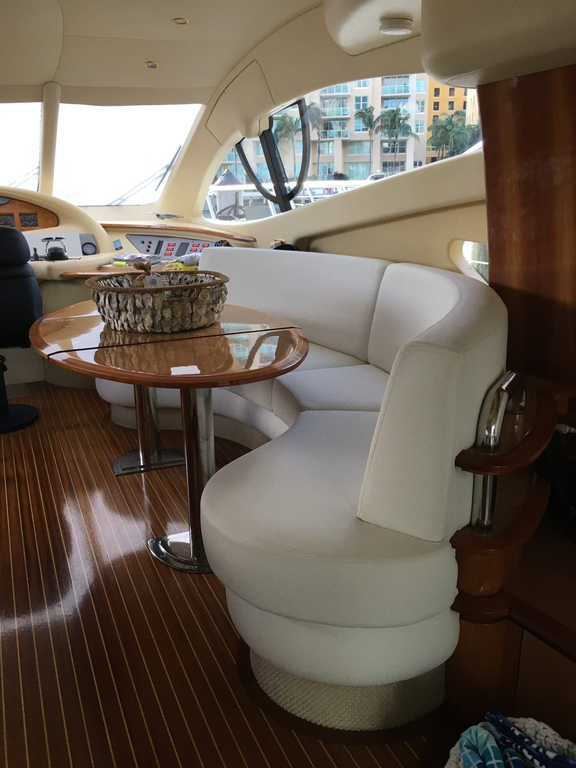 Luxury yacht refitting and white salon sofa 